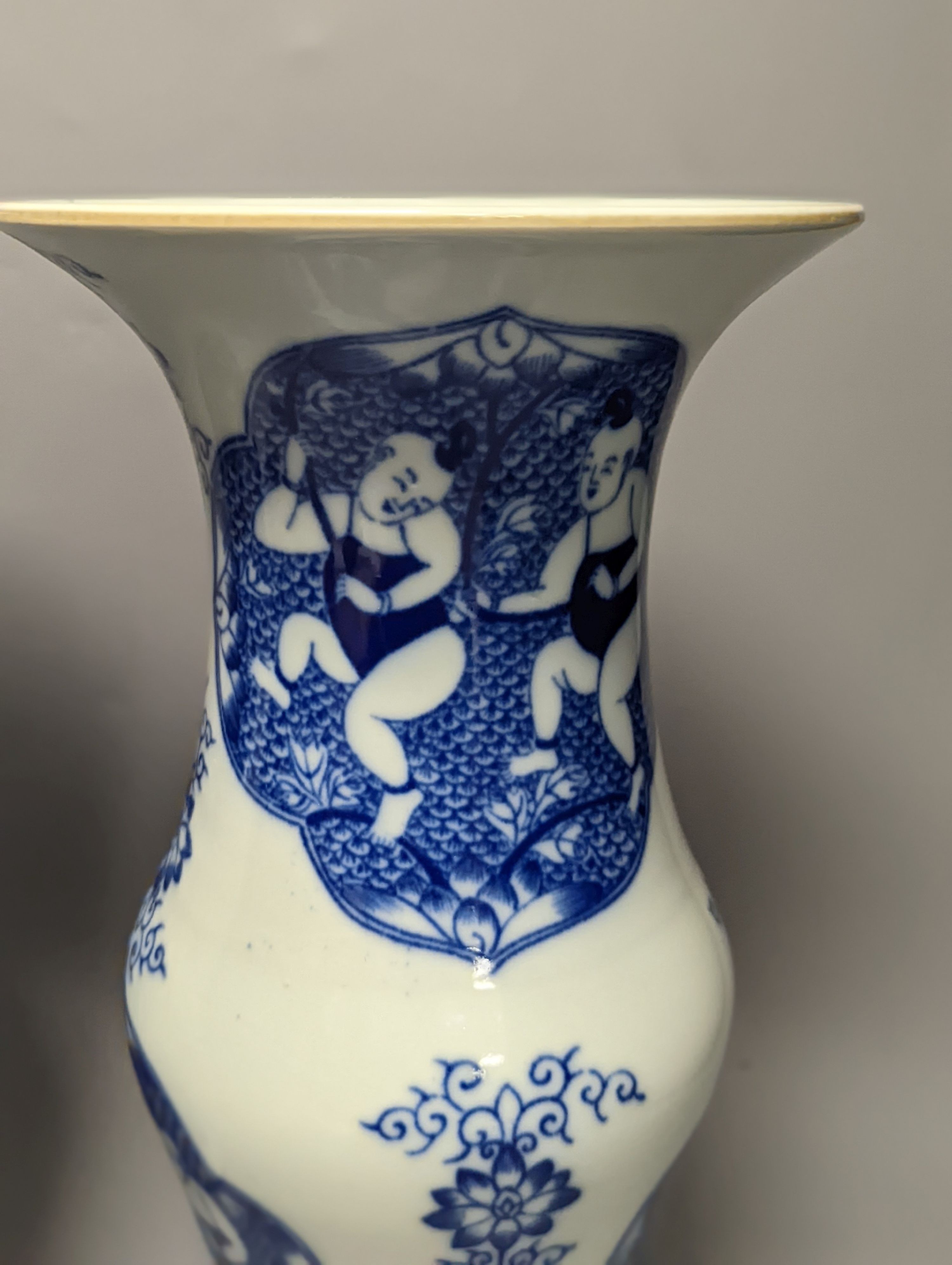 A pair of Chinese blue and white vases on stands and 6 further wood stands. Vases 35cm